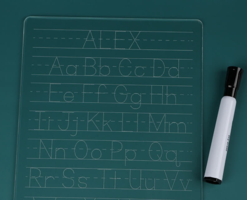Clear board with dotted lines to draw each letter of the alphabet in upper and lowercase